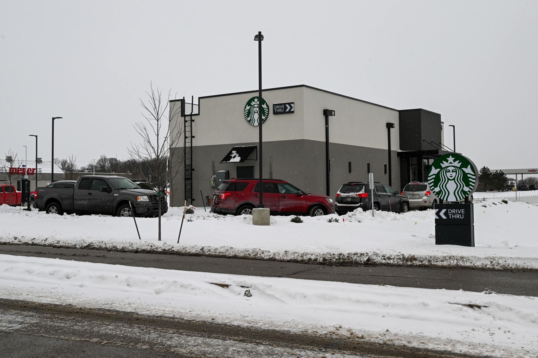 Line of cars outside Angola Starbucks